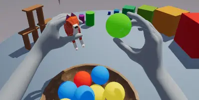 The user's hands wrapping around a ball and fox model